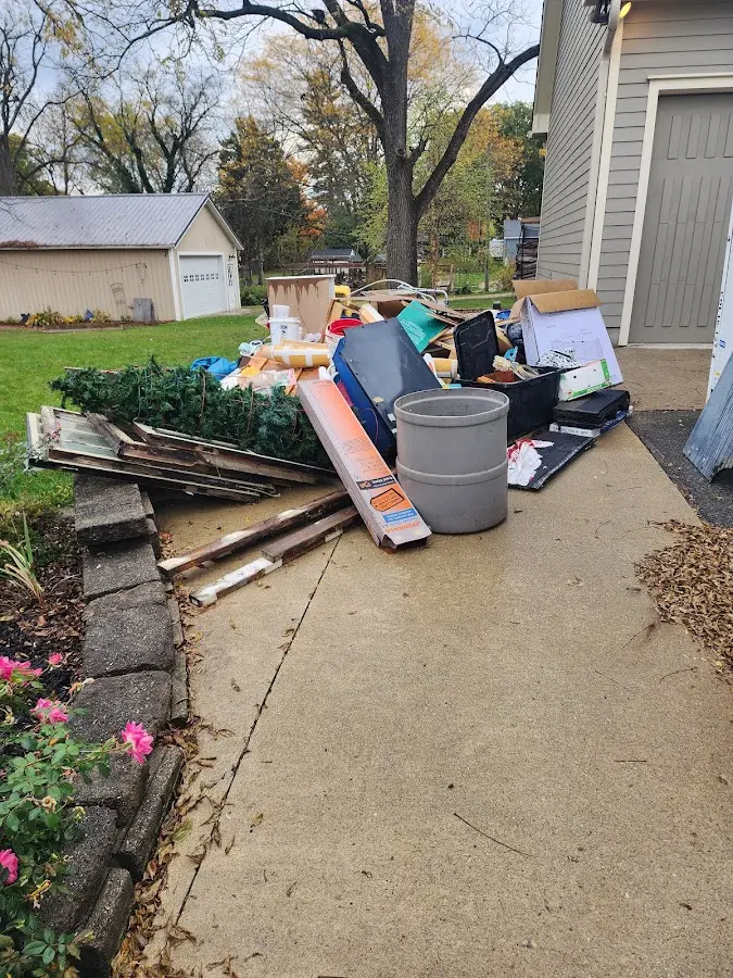 Dumpster being loaded with debris for Demolition Dumpster Rental in Gardnerville Ranchos
